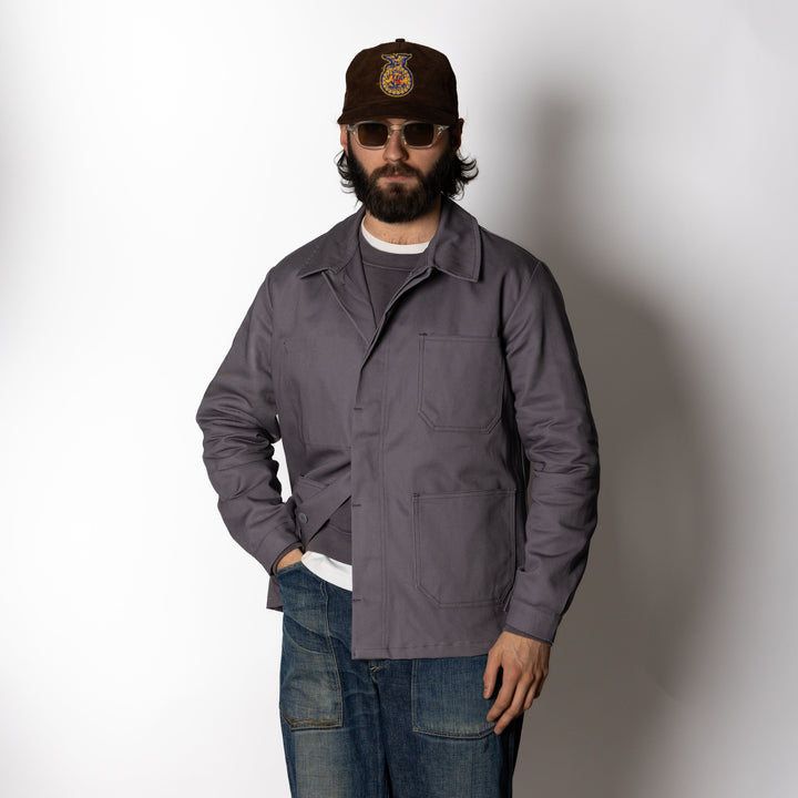 Men's gray utility jacket with collar and multiple patch pockets