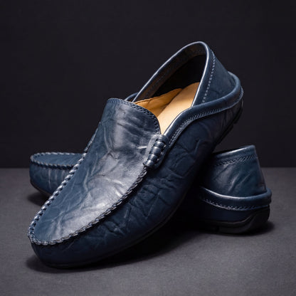 Unisex moc-toe loafers with stitched trim and flat soles