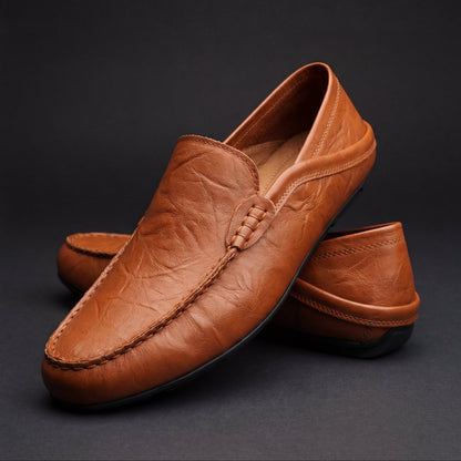 Unisex moc-toe loafers with stitched trim and flat soles