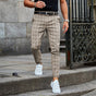 Men's tapered checked chino trousers with belt loops and ankle-length legs
