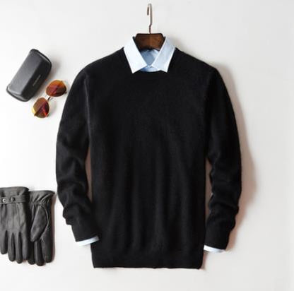 Solid crew neck sweater with long sleeves and ribbed trims layered over a collared shirt