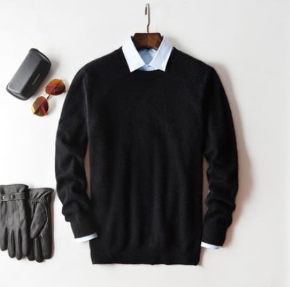 Solid crew neck sweater with long sleeves and ribbed trims layered over a collared shirt