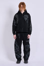 Black unisex zip hoodie with hood, long sleeves and contrasting graphic prints