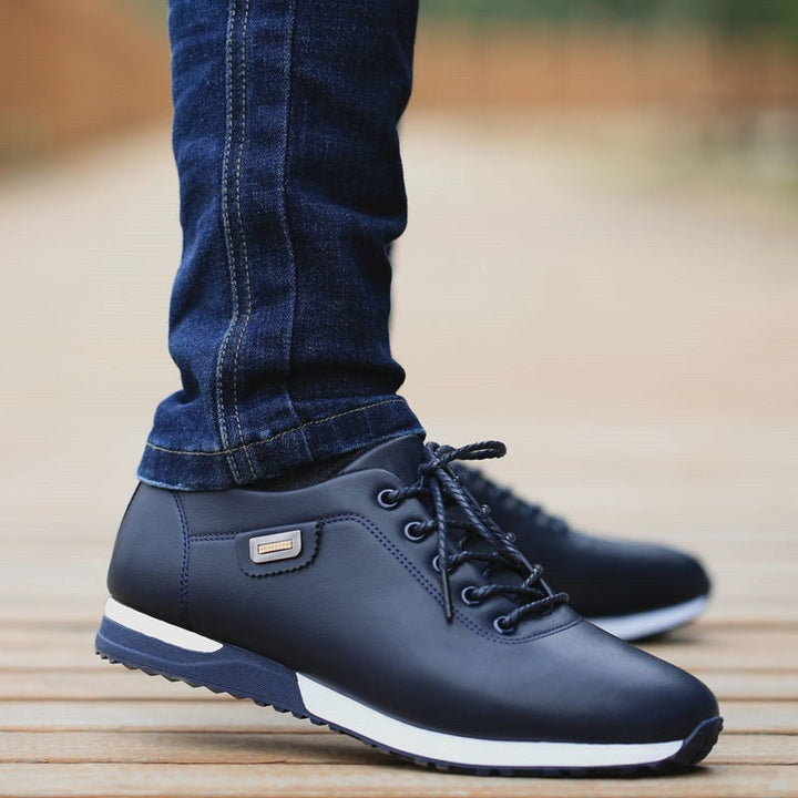 Men's low-top lace-up trainers with rounded toes, layered soles and textured outsoles