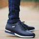 Men's low-top lace-up trainers with rounded toes, layered soles and textured outsoles