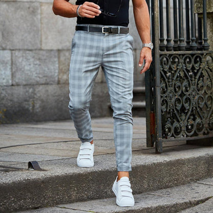 Men's tapered checked chino trousers with belt loops and ankle-length legs