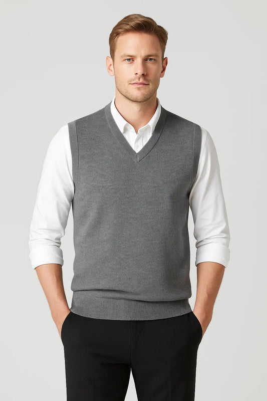 Men's sleeveless V-neck sweater vest with ribbed trims worn over a white shirt