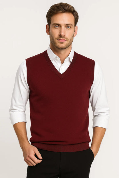 Men's sleeveless V-neck sweater vest with ribbed trims worn over a white shirt