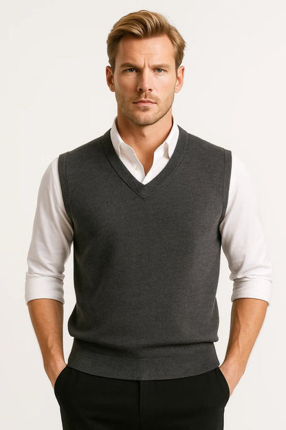 Men's sleeveless V-neck sweater vest with ribbed trims worn over a white shirt