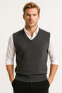 Men's sleeveless V-neck sweater vest with ribbed trims worn over a white shirt