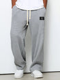 Men's relaxed fit trousers with drawstring waist in blue textured weave
