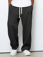Men's relaxed fit trousers with drawstring waist in blue textured weave