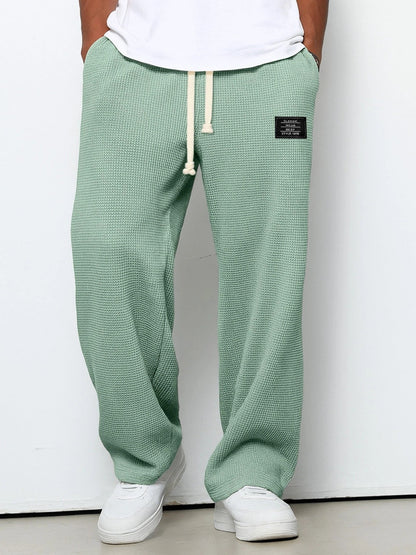 Men's blue textured pants with drawstring waist