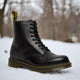 Men's ankle-height combat boots with lace-up front and chunky sole
