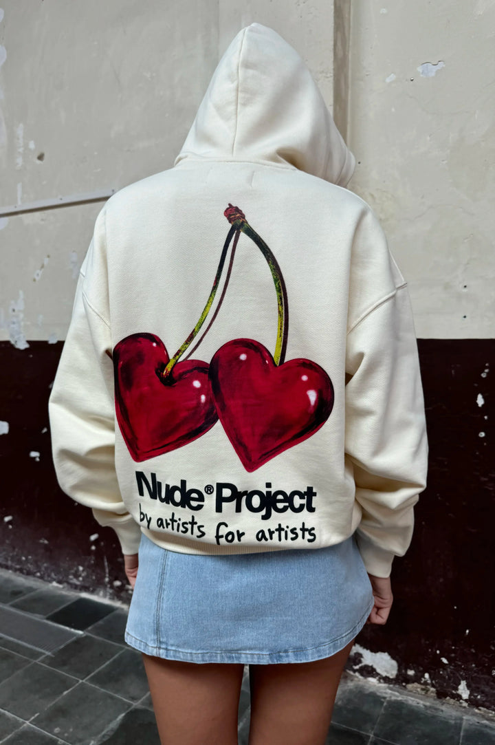 Ivory hoodie with red cherry graphic and hood