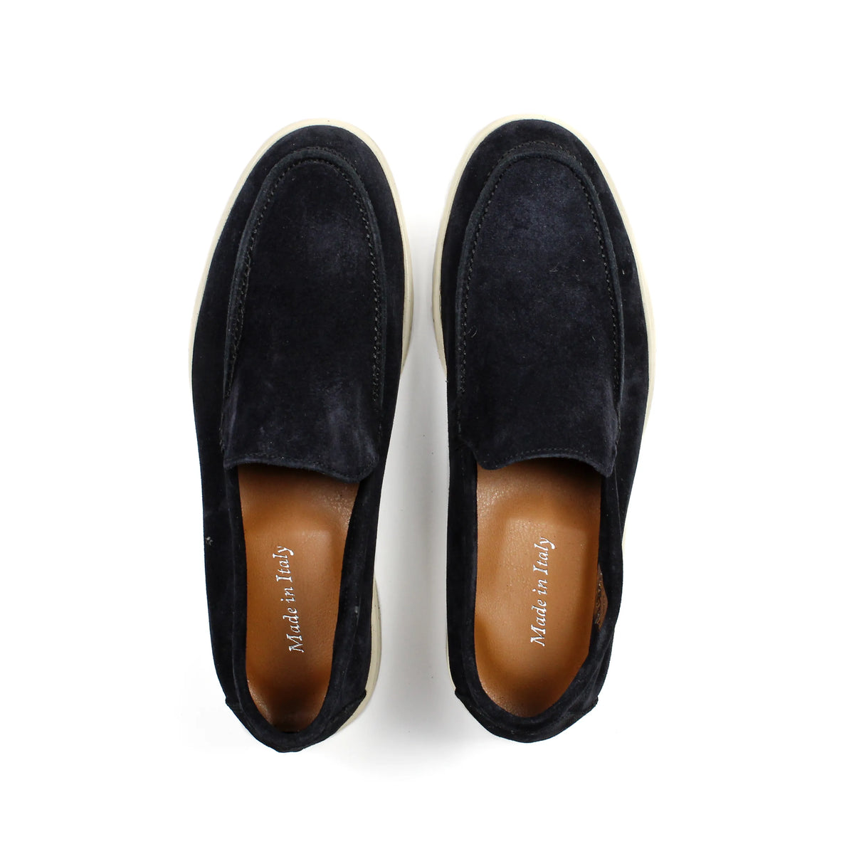 Black men's slip-on loafers with rounded toes and contrasting light soles