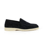 Black men's slip-on loafers with rounded toes and contrasting light soles