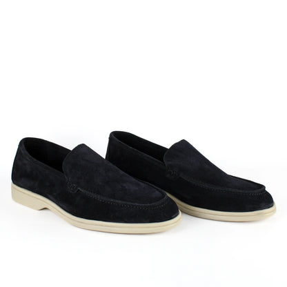 Black men's slip-on loafers with rounded toes and contrasting light soles
