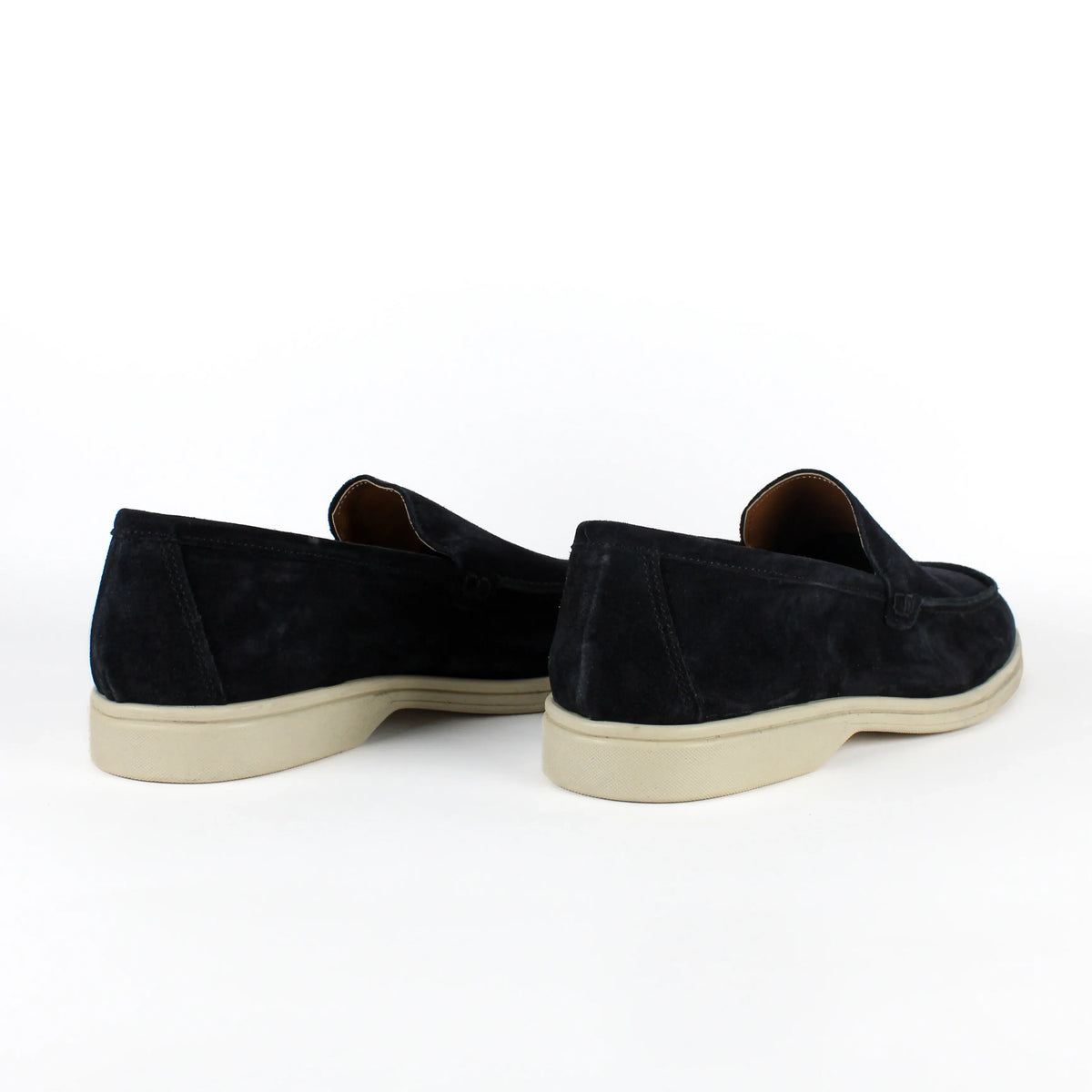 Black men's slip-on loafers with rounded toes and contrasting light soles