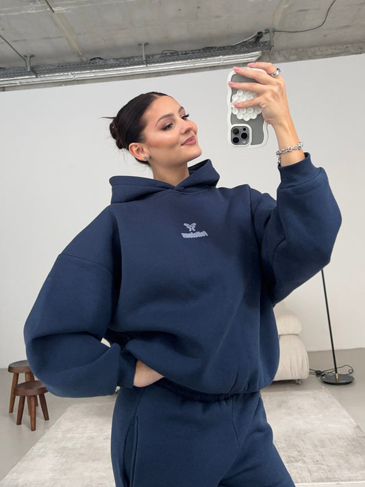 Navy hooded sweatshirt with long sleeves, ribbed trims and chest logo
