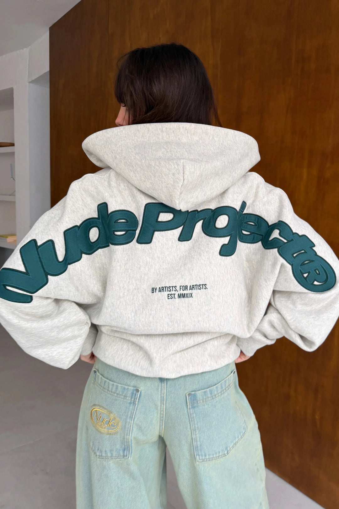 Grey graphic zip-up hoodie with hood and lettering