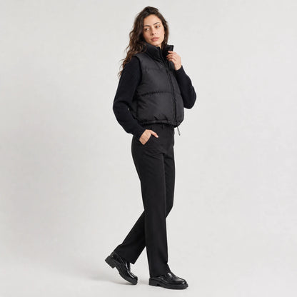 Women's cropped padded gilet with hooded collar, front zip and adjustable hem