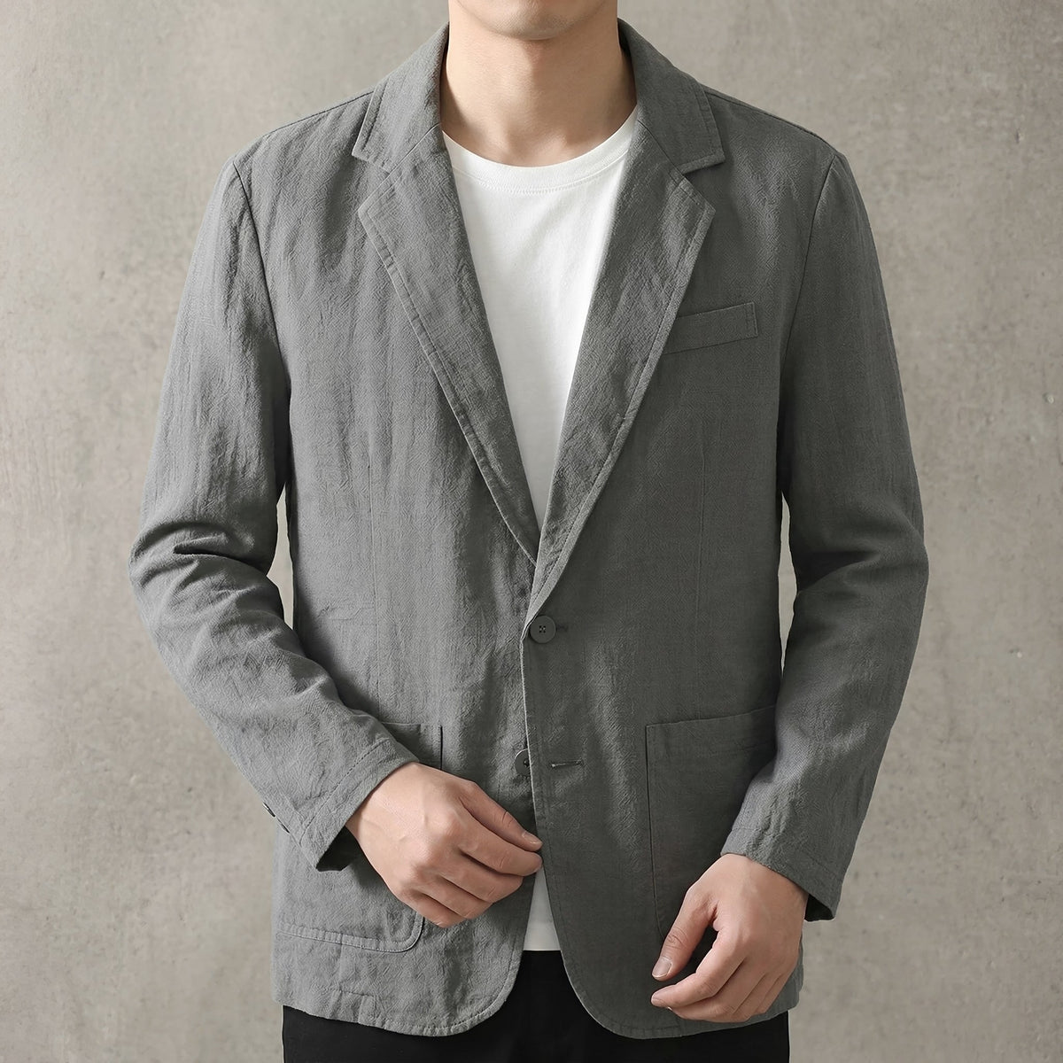 Men's textured blazer with notch lapels, long sleeves, buttons and patch pockets