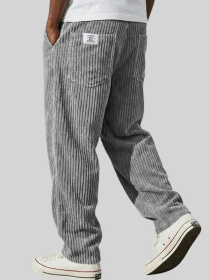 Men's ribbed corduroy trousers with elastic waist and straight legs