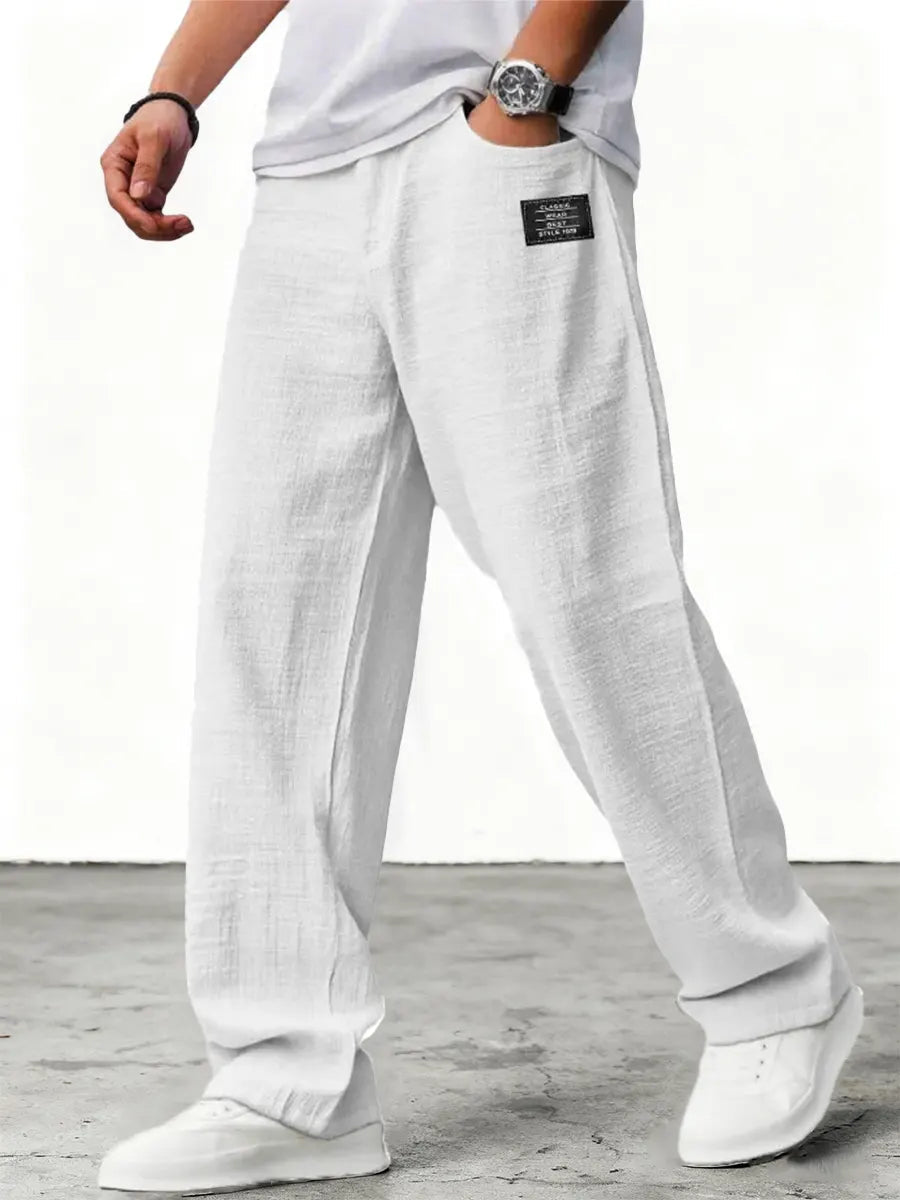 Men's relaxed fit wide leg summer trousers in blue with flat front waist and textured finish