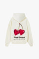 Ivory hoodie with red cherry graphic and hood