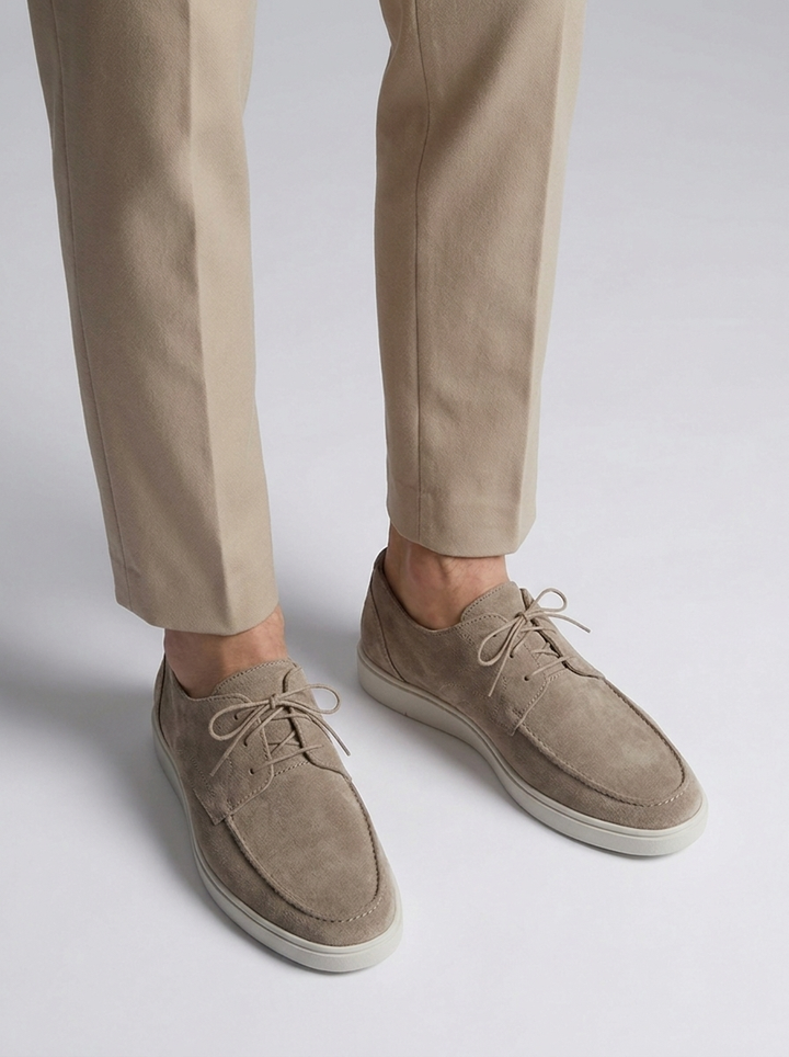 Men's lace-up loafers with moc-toe stitching and contrasting soles