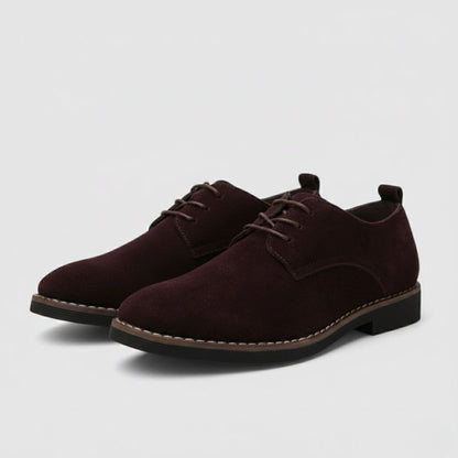 Men's lace-up derby shoes with rounded toes, low heels and stitched panel detailing