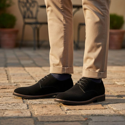 Men's lace-up derby shoes with rounded toes, low heels and stitched panel detailing