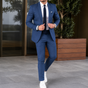 Men's two-piece suit with tailored blazer and slim trousers