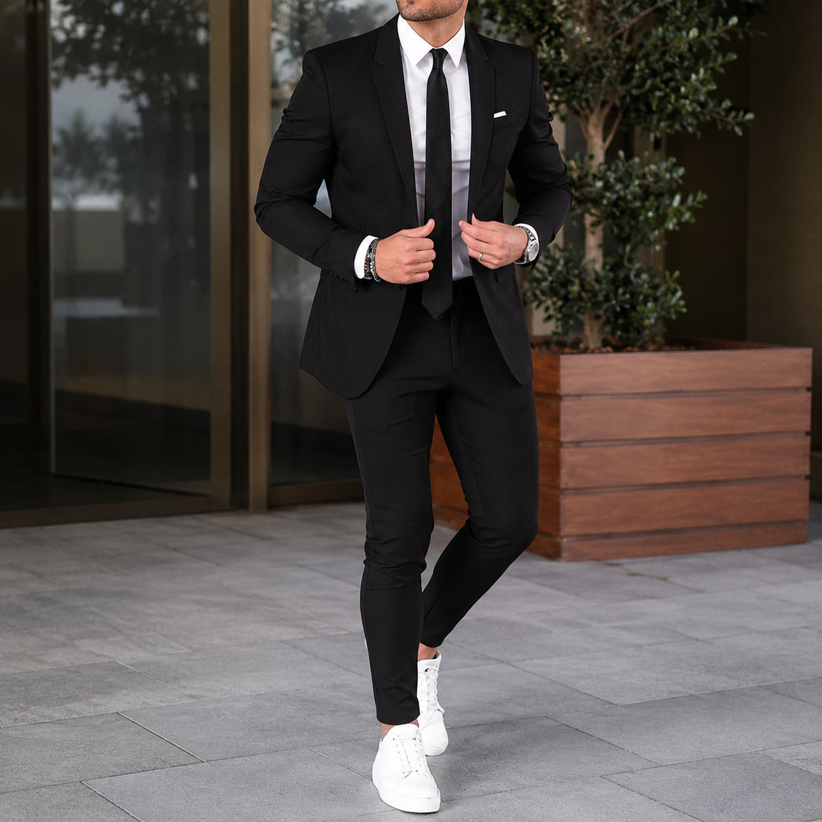 Men's two-piece suit with tailored blazer and slim trousers