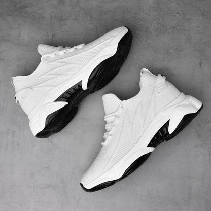 Men's lace-up trainers with a raised sole and panelled upper