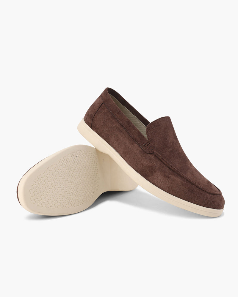 Slip-on loafers with almond toes, moc stitching and raised wedge soles