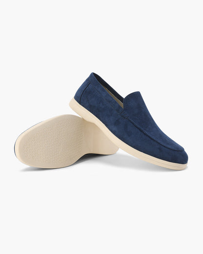 Slip-on loafers with almond toes, moc stitching and raised wedge soles