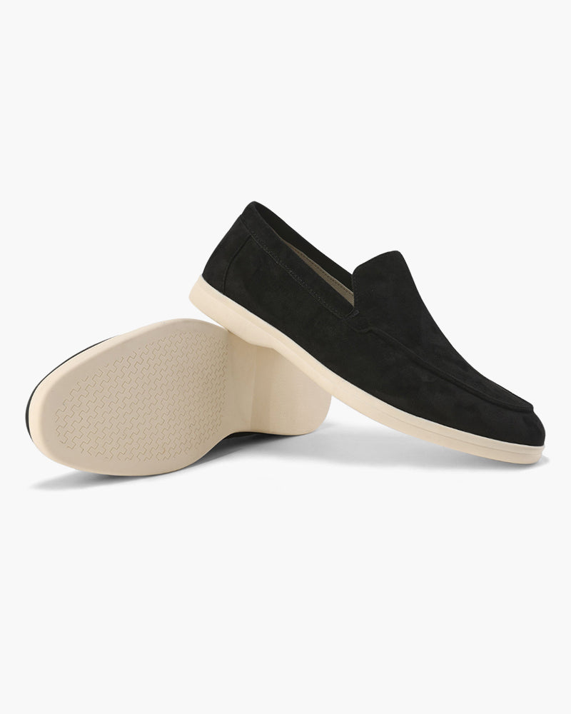 Slip-on loafers with almond toes, moc stitching and raised wedge soles