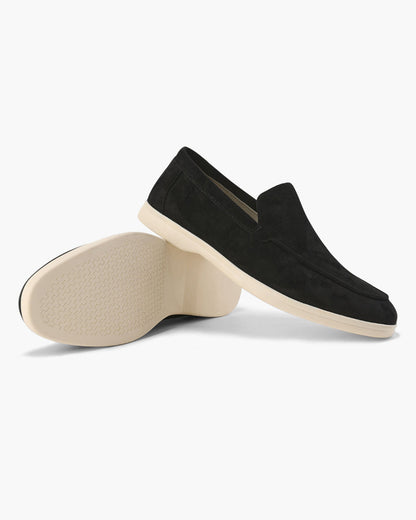 Slip-on loafers with almond toes, moc stitching and raised wedge soles