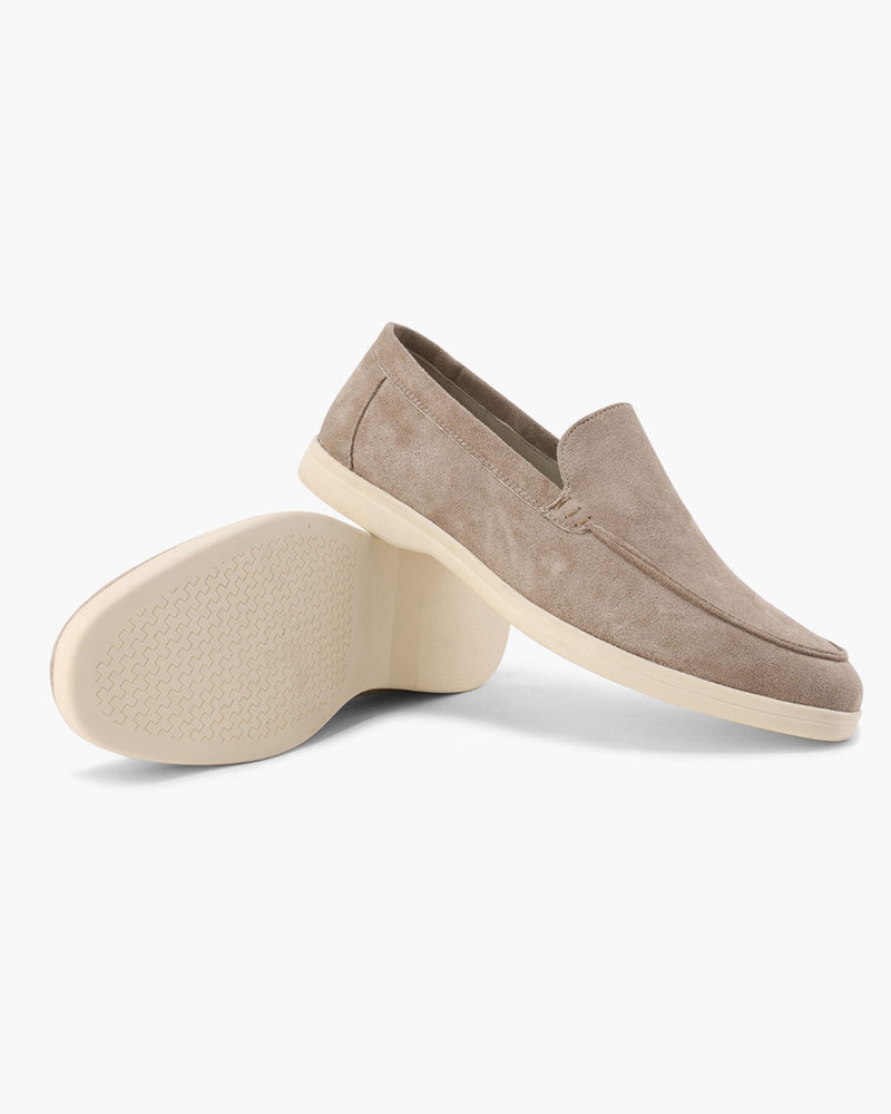 Slip-on loafers with almond toes, moc stitching and raised wedge soles