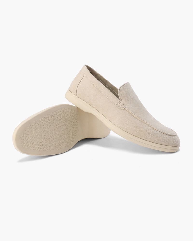 Slip-on loafers with almond toes, moc stitching and raised wedge soles