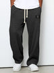Men's wide leg textured trousers with drawstring waist, shown in blue and cream variants