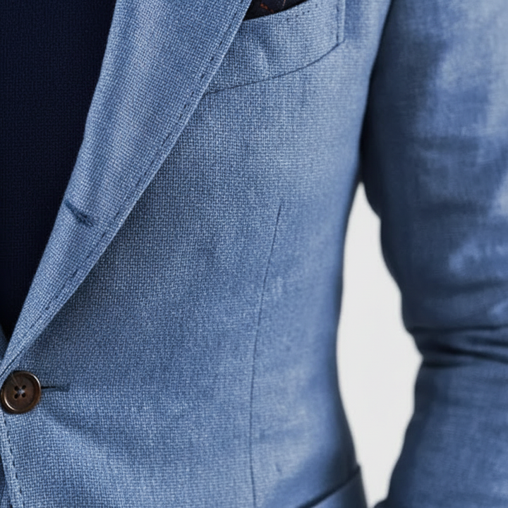 Men's notch lapel button front blazer with long sleeves and flap pockets