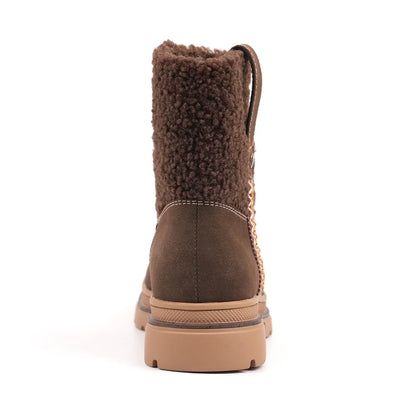 Brown ankle boots with textured collar, side zip and treaded sole