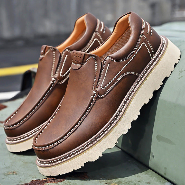 Slip-on moc toe loafers with contrast stitching and chunky lug soles