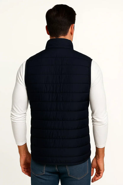 Men's quilted sleeveless puffer vest with mock neck and zip pockets