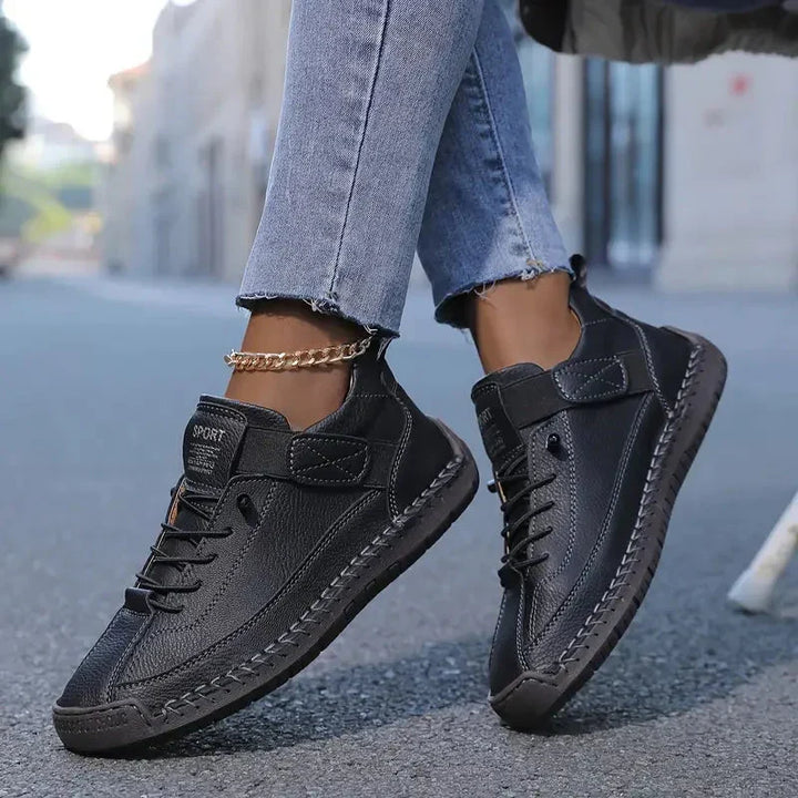 High top sneakers with laces, upper strap and contrast sole