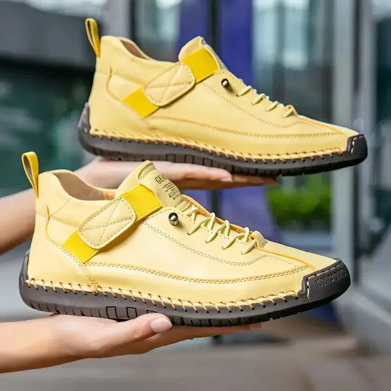 High top sneakers with laces, upper strap and contrast sole