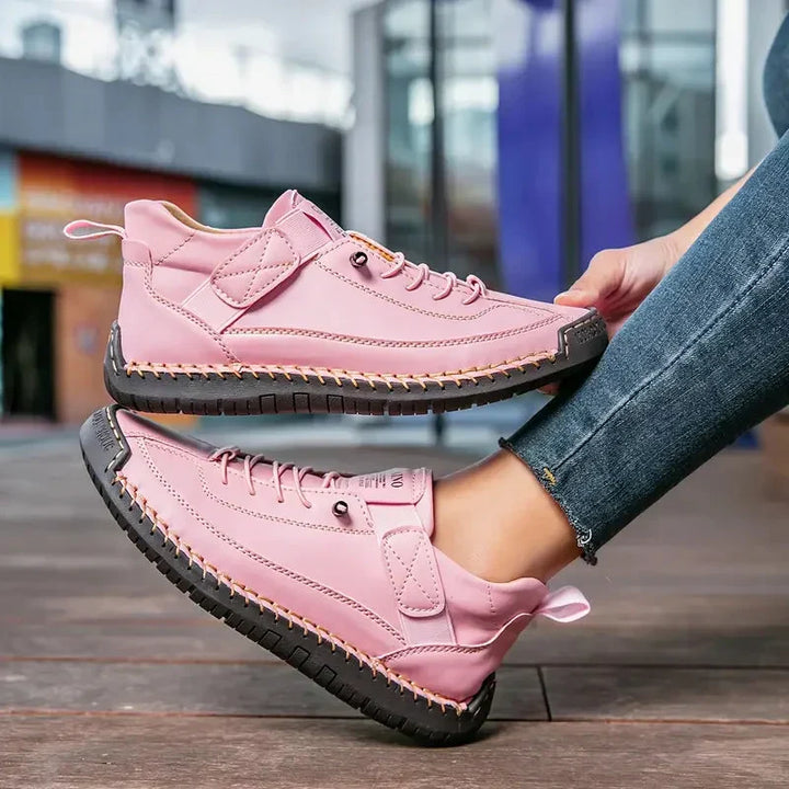 High top sneakers with laces, upper strap and contrast sole